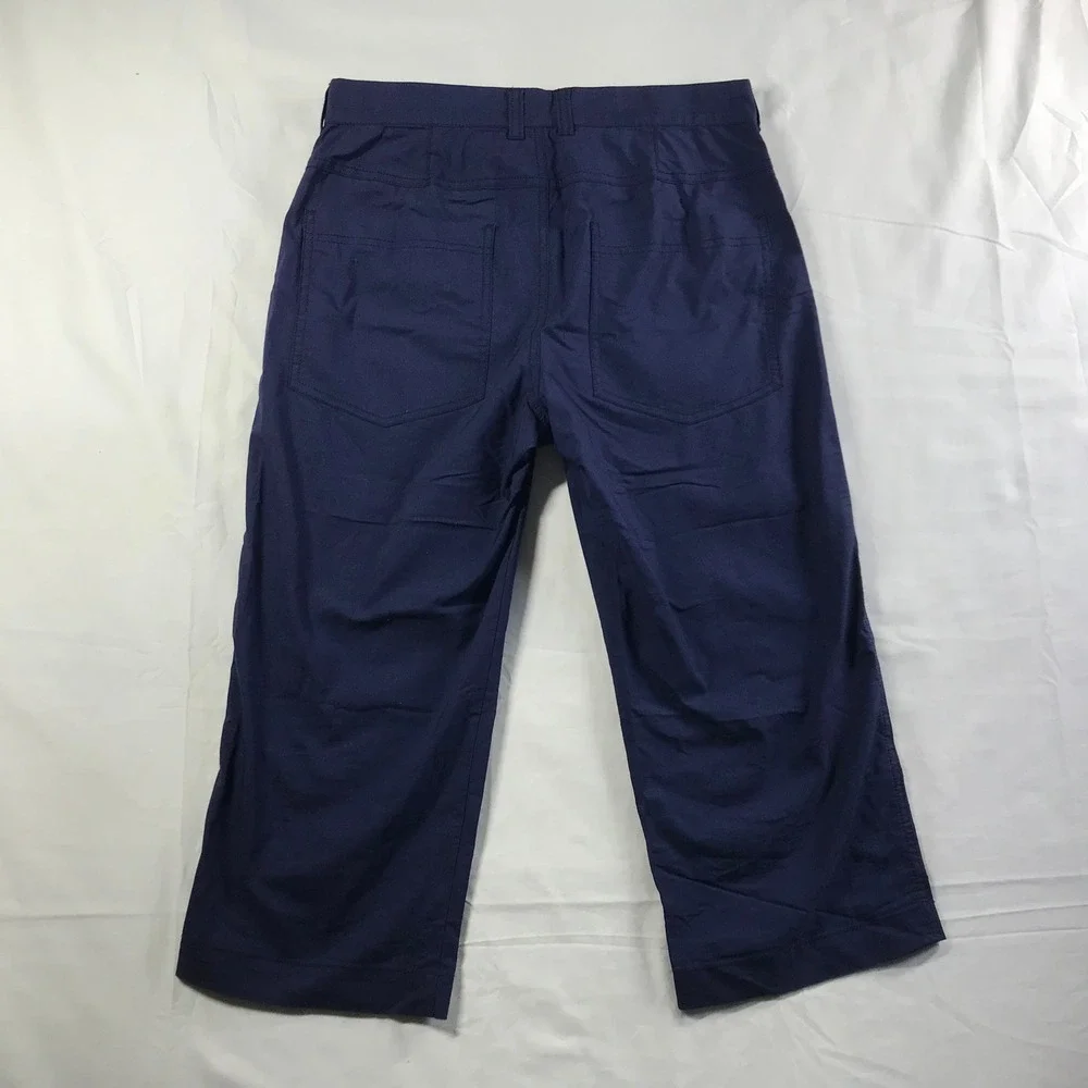 Nike Men's Navy Cargo Pants with Orange Swoosh Accent